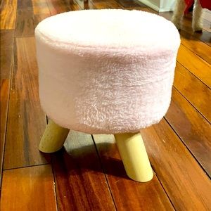 Small fluffy pink chair